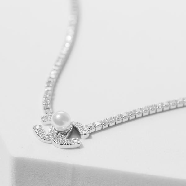 Pearl Chanel tennis pendent